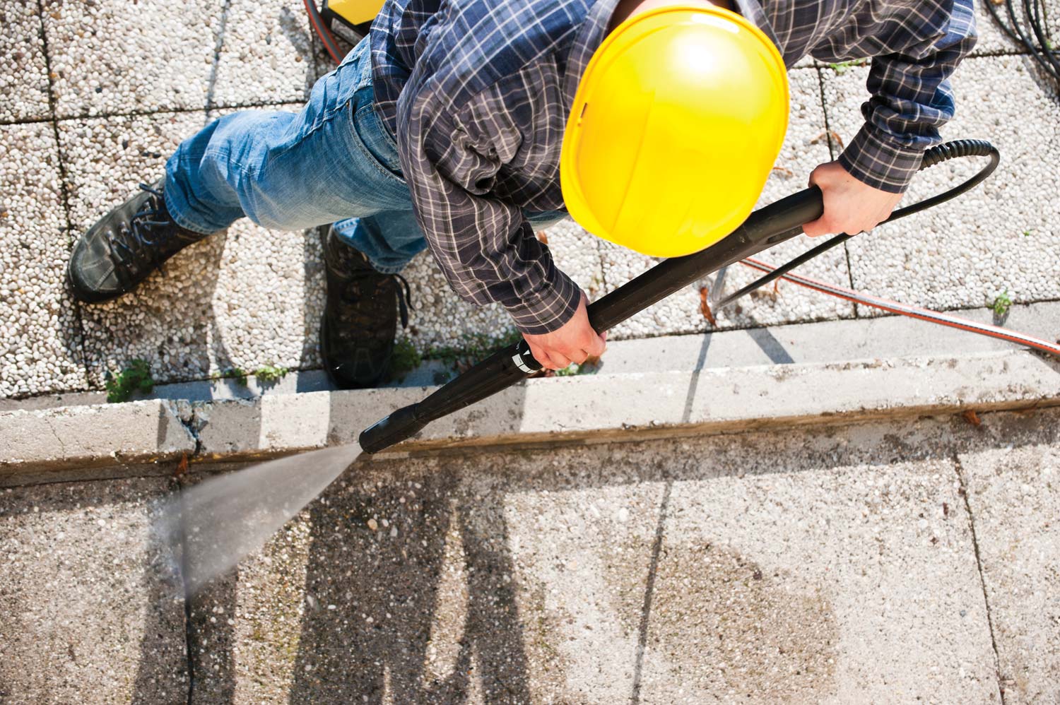 Cleaning & restoration of Devon's Pavements with Mark's Cleaning's pressure washers